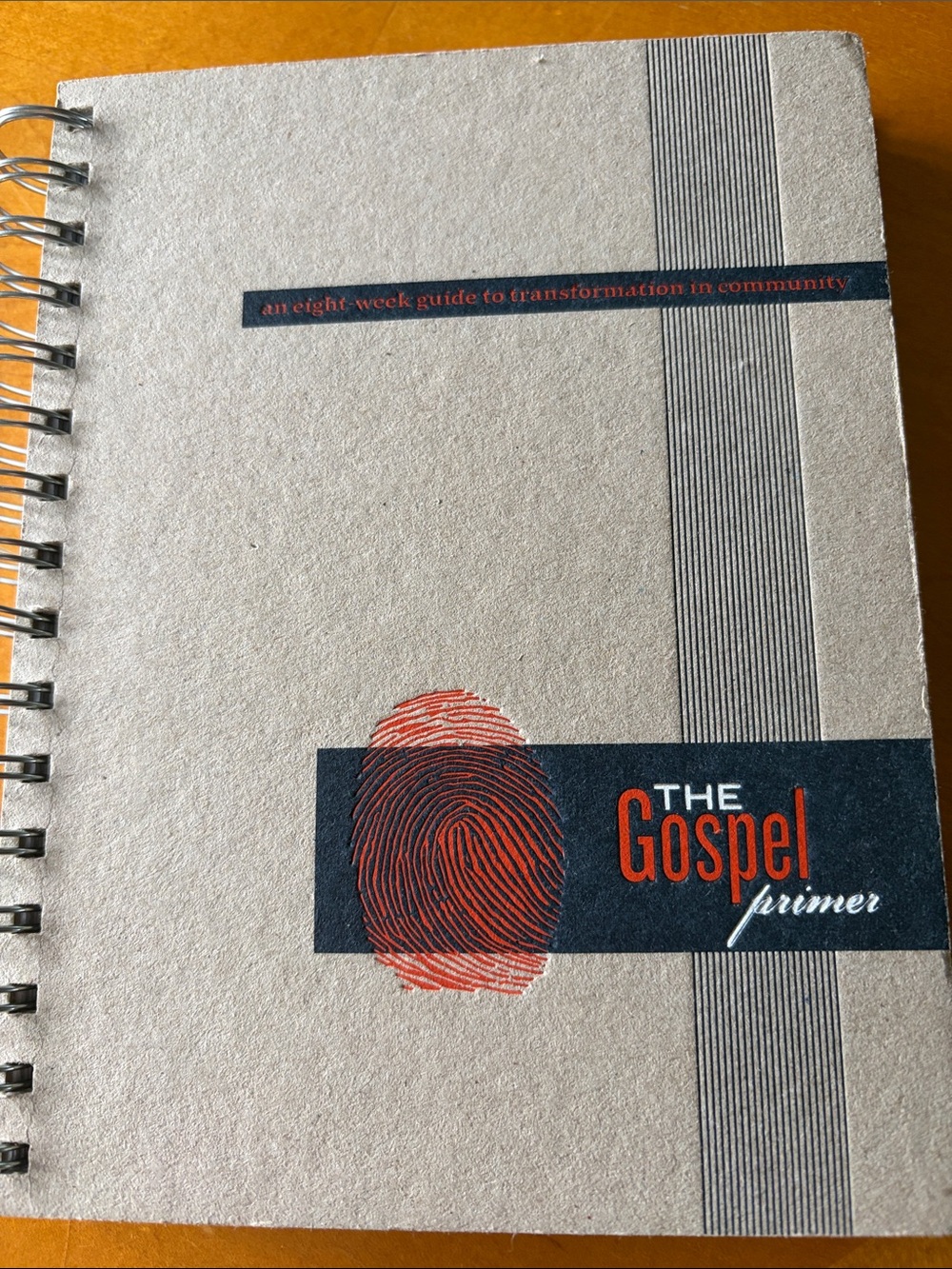 The Gospel Primer Spiral Notebook - Gray with Orange Accent